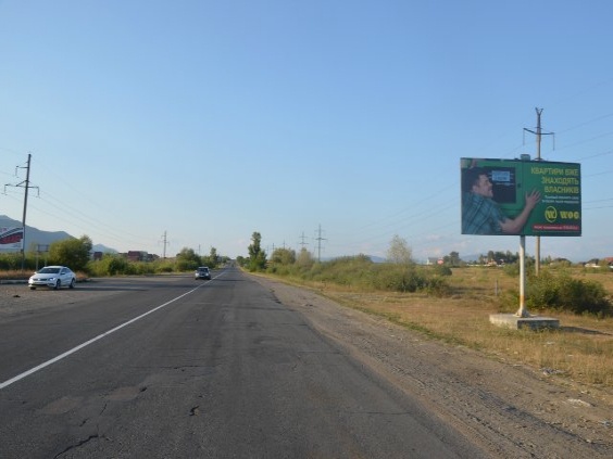 Щит 6x3,  м.Хуст обїзна дорога, в сторону м.Мукачево, трасса Рогатин - Мукачево (біля ринку)